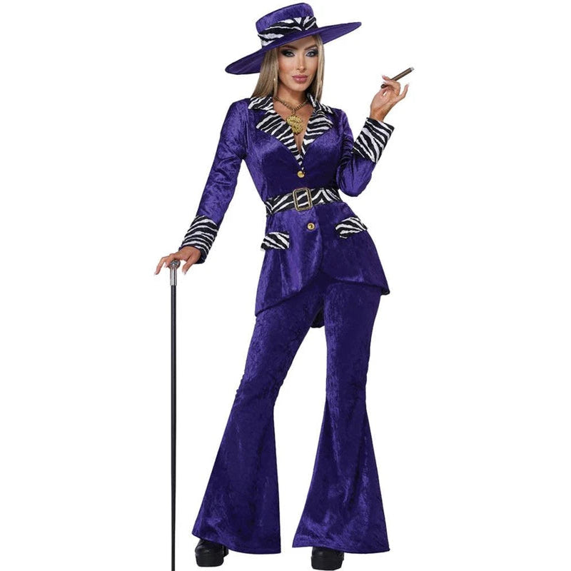 A woman modeling a purple 1950s-style flapper costume with a matching wide-brim hat, black-and-white striped trim, and a cane, against a plain white background.