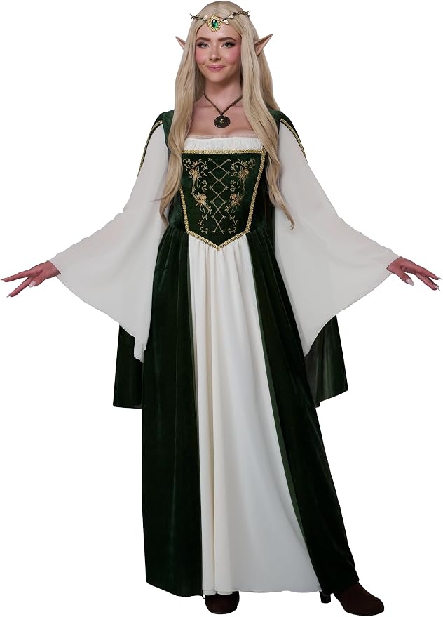 A woman modeling a medieval elf queen costume with a long white dress, dark green velvet cloak, and gold embroidered details, set against a plain white background.