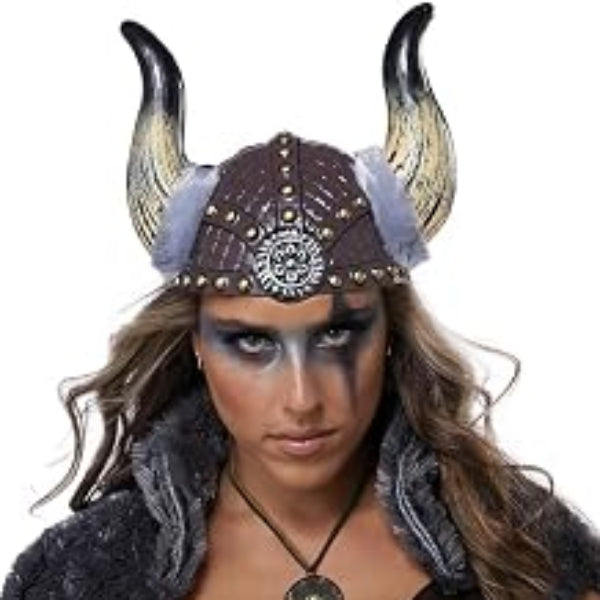 A woman modeling a Viking costume set against a plain white background. The costume includes a horned helmet, dark brown and black scale-patterned dress, gray faux-fur trim, a matching cape, armbands, leg warmers, and tall brown boots.