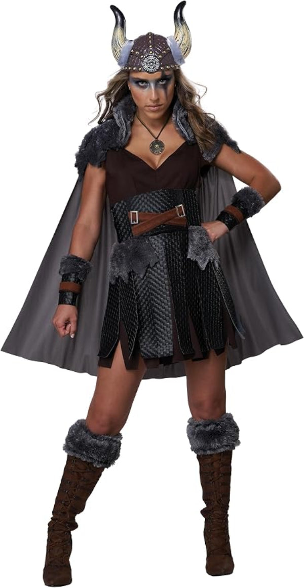 A woman modeling a Viking costume set against a plain white background. The costume includes a horned helmet, dark brown and black scale-patterned dress, gray faux-fur trim, a matching cape, armbands, leg warmers, and tall brown boots.
