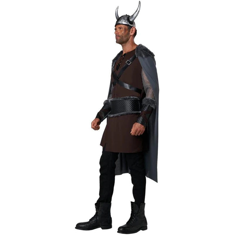 A man modeling a Viking warrior costume consisting of a dark brown tunic, black pants, a dark gray cape, a horned metal helmet, and a black belt, shown against a plain white background.