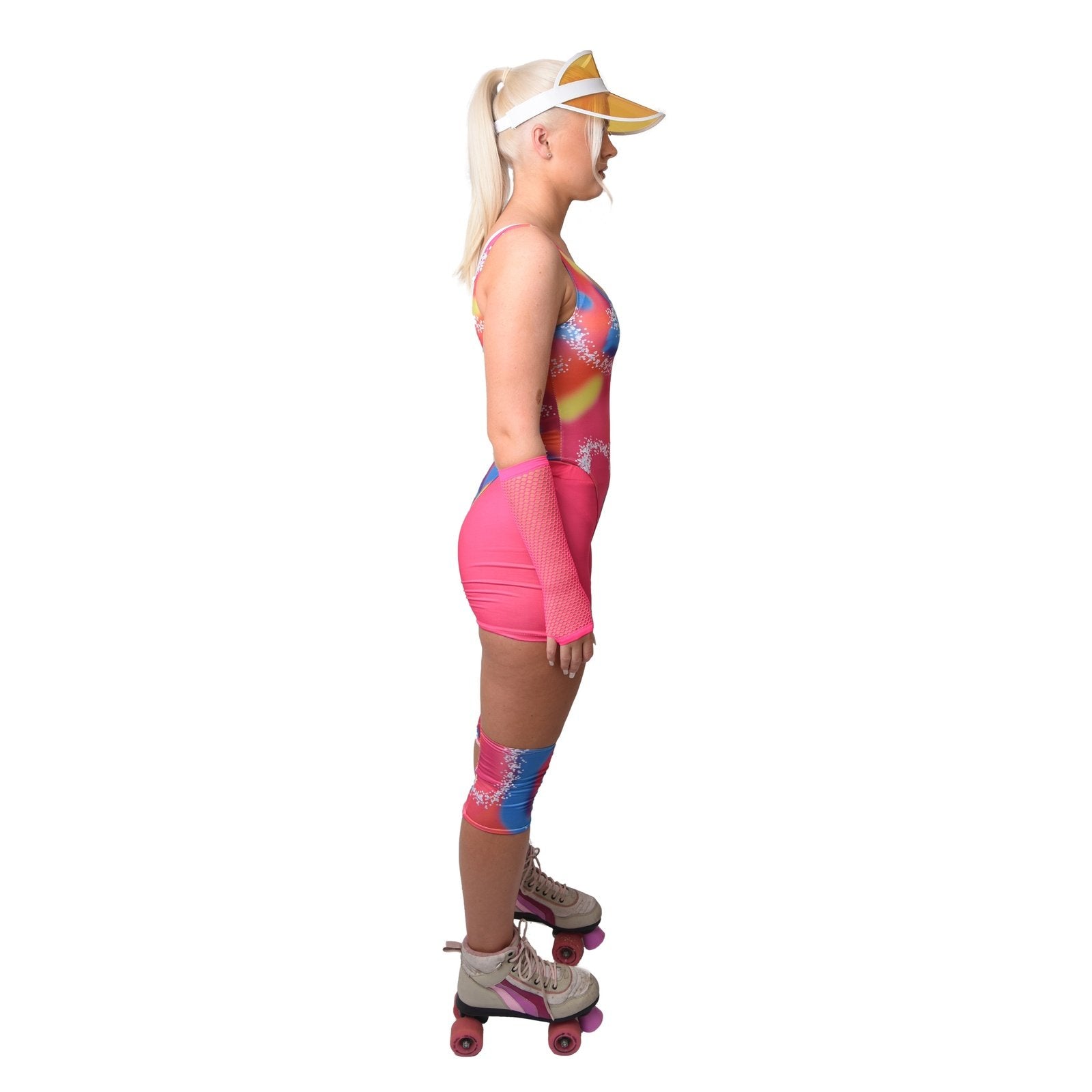 Beautiful woman dressed in a fashion doll costume wearing roller blades