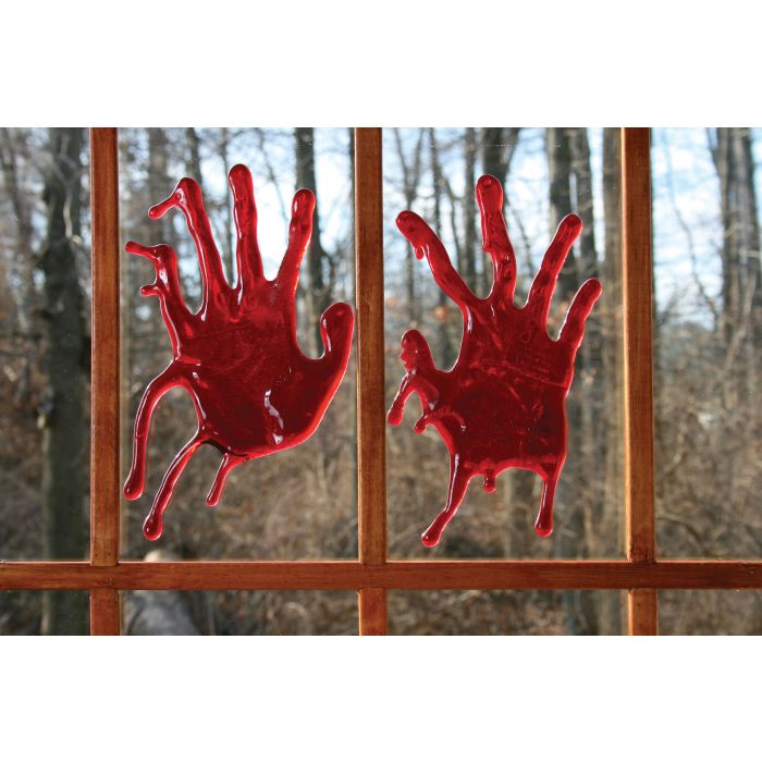 Spooky Halloween decoration of realistic bloody handprint window clings in motion