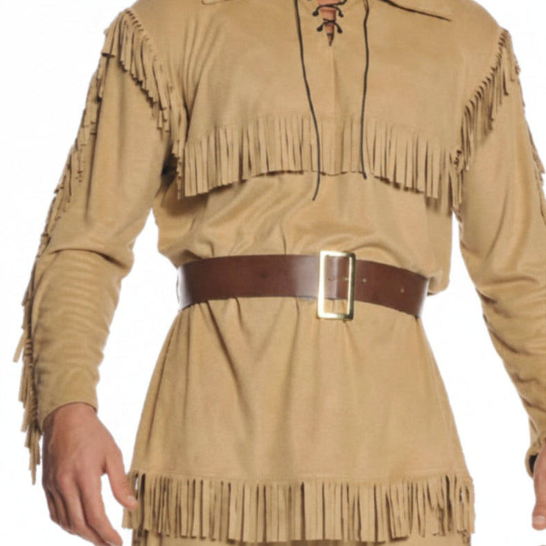 A man modeling a tan faux-suede fringed costume with a brown belt, brown boots, and a brown faux-fur hat against a plain white background.