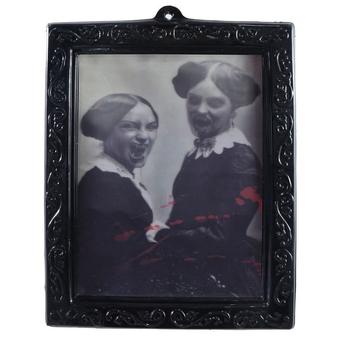 vintage-style portraits in ornate black frames on a white background