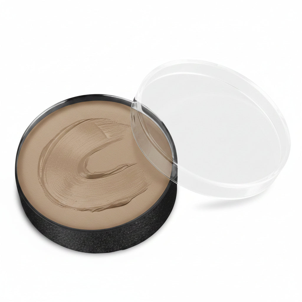 A round makeup compact with a dark charcoal base and a taupe-brown pressed powder, shown with its clear plastic lid resting beside it on a white background.