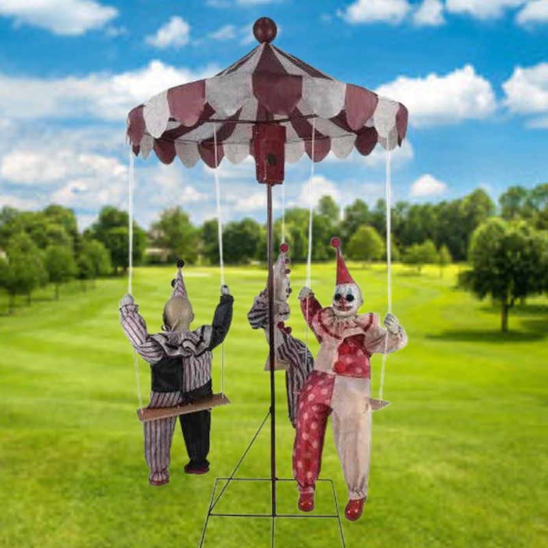 Colorful animated clown go round prop with spinning motion and joyful expression
