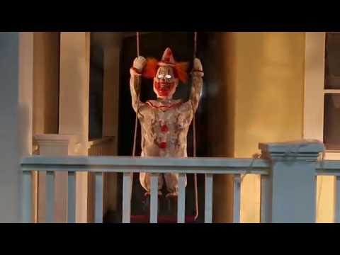 Load video: Animated Swinging Happy Clown Doll