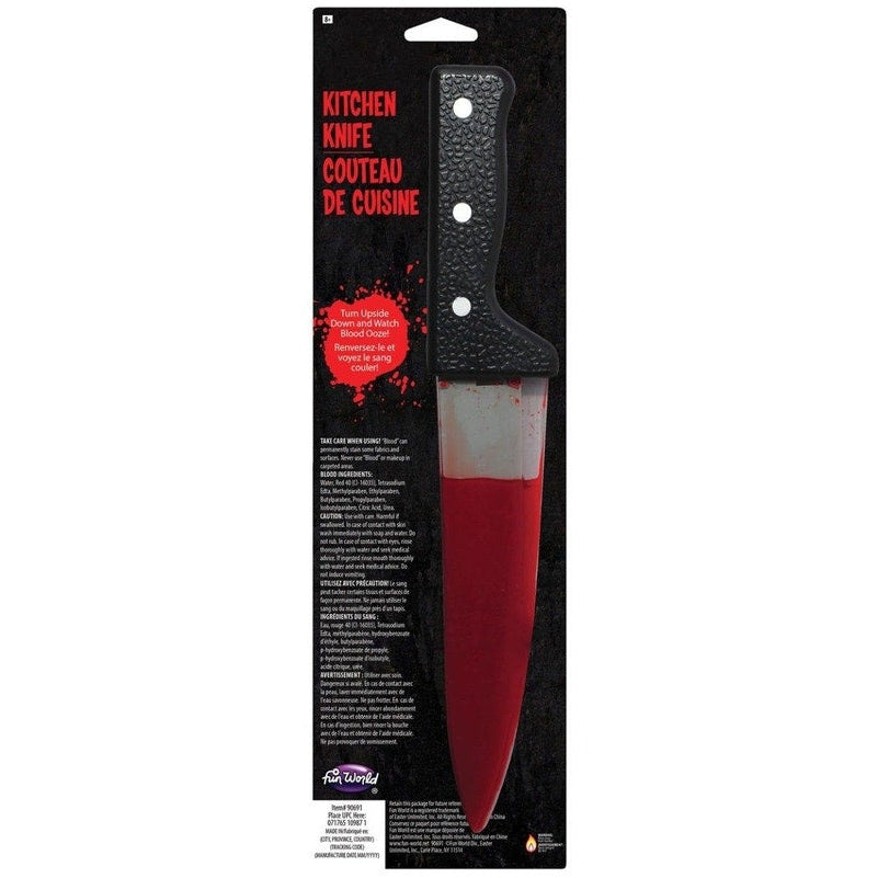 High-angle view of the 13 Bleeding Kitchen Knife on a cutting board with blood splatter effect