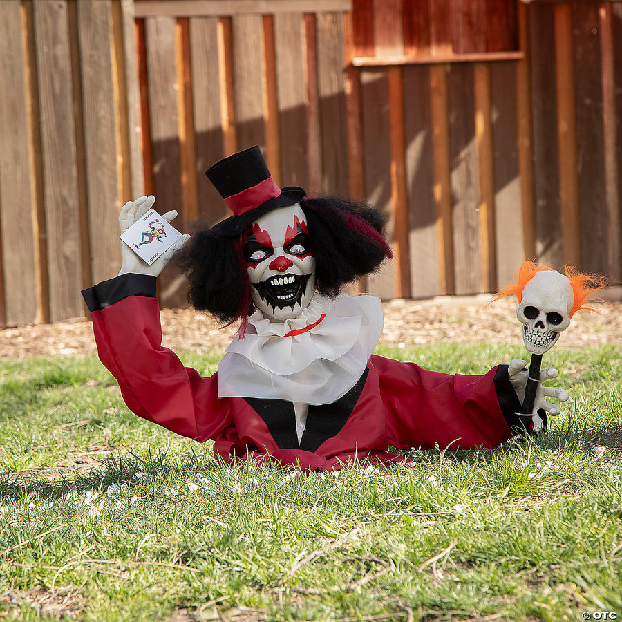 A spooky Halloween decoration of an Animated Groundbreaker Clown with creepy grin