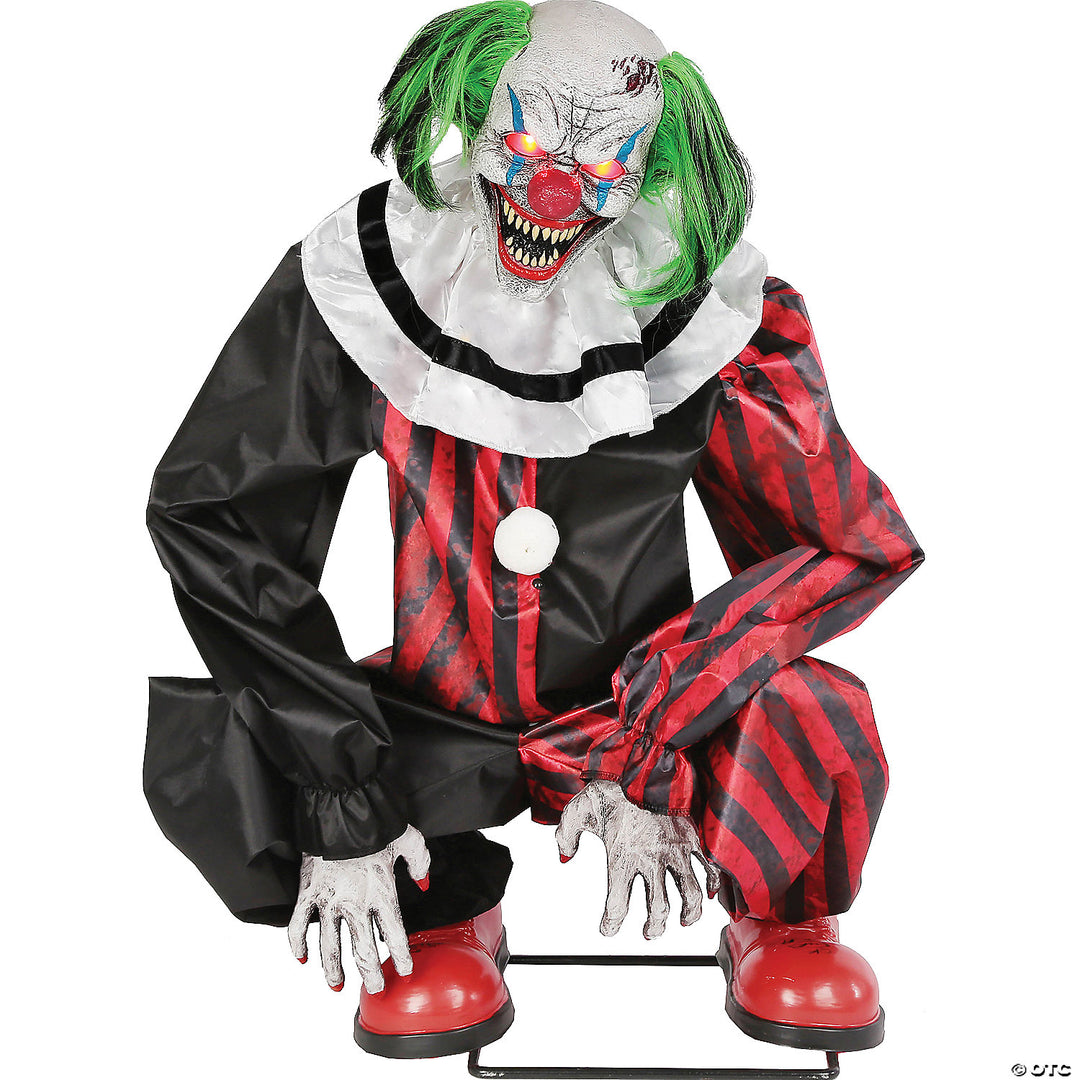 A spooky 20-inch animated crouching red clown prop for Halloween decoration