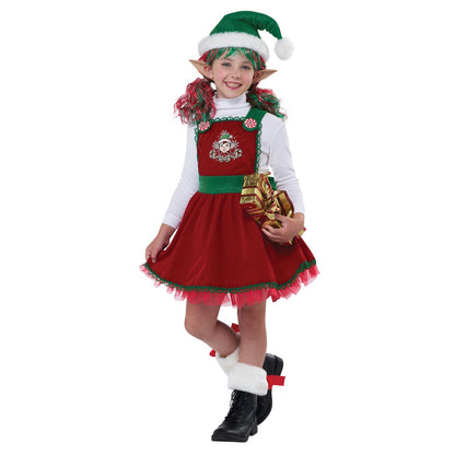 An adorable child dressed as an elf holding a candy cane