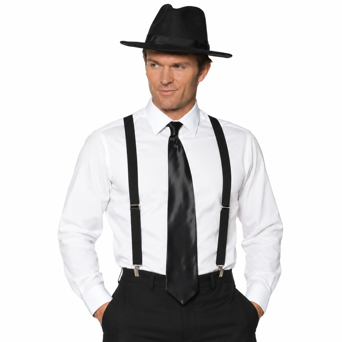 A man modeling a black fedora hat, black suspenders, a black necktie, and black trousers over a white dress shirt, photographed against a plain white background.