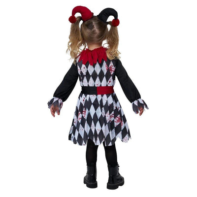 A child model from behind wearing a black and white harlequin diamond costume dress with red accents, a red bow, and a matching red and black jester horn headband, set against a plain white background.