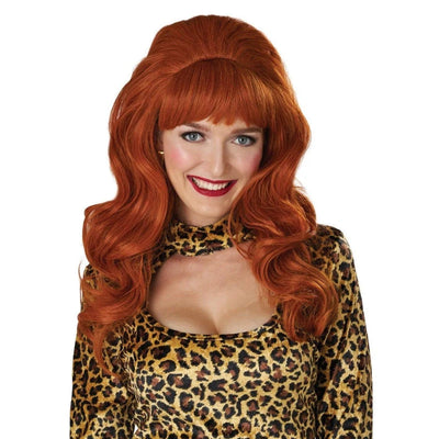 A woman modeling a long, wavy red wig with a straight bang and a leopard-print costume top against a plain white background.
