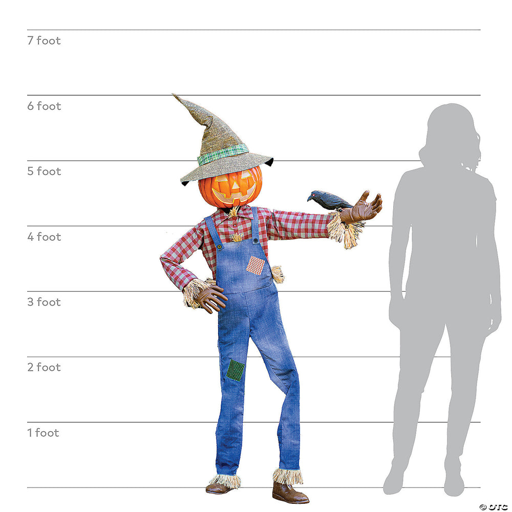 Realistic looking scarecrow with straw hat and colorful clothing reaching out arms