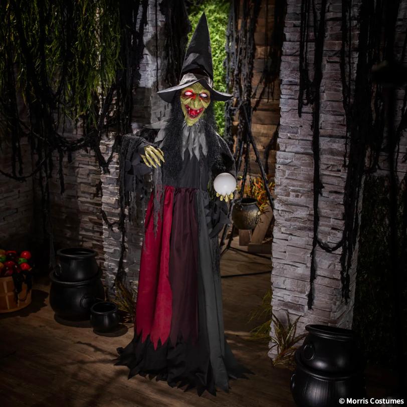 6 Ft. 2" Animated Light-Up Standing Talking Witch with Green Face Halloween Decoration