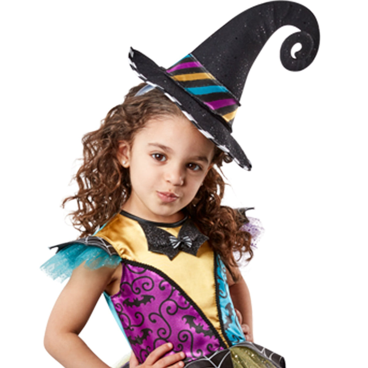 Child wearing a colorful witch costume with a pointed hat on a white background