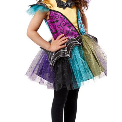 Child wearing a colorful Halloween costume with purple, green, and black accents.