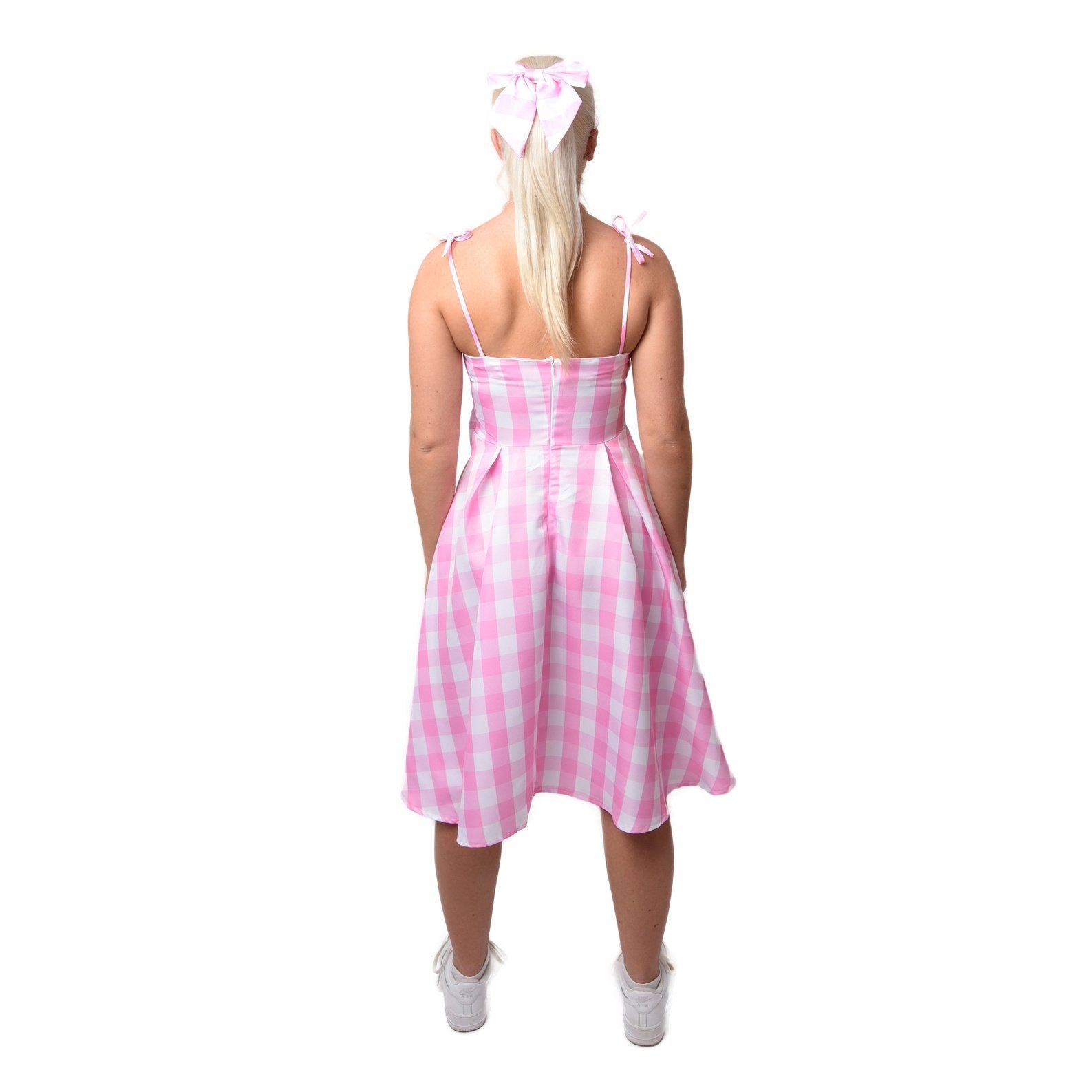 Beautiful pink fashion doll summer women dress with floral design and flowing skirt