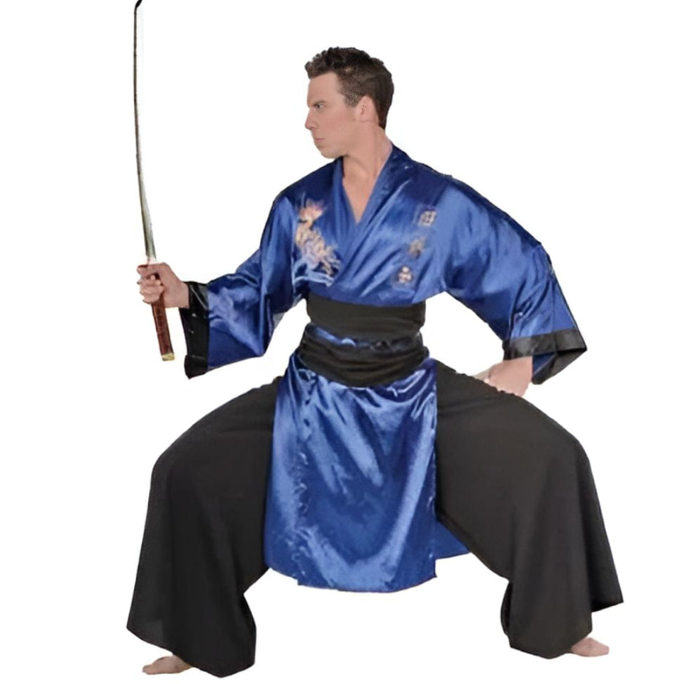 A man modeling a blue and black Japanese-style martial arts costume, featuring a shiny blue kimono robe with gold dragon embroidery, a black waist sash, and wide black pants, while holding a katana sword against a plain white background.