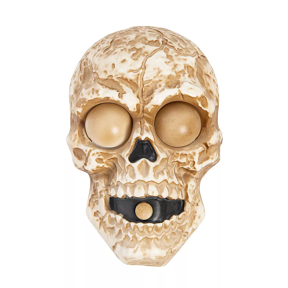 Black metal skull door bell with intricate details and a vintage look