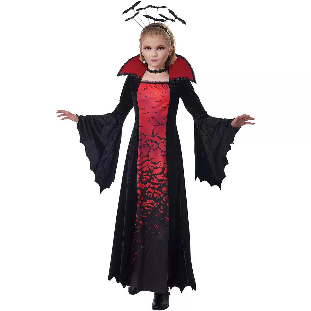 Alt text: Black and red Midnight Flight Vampire Child Costume with cape and fangs for Halloween dress-up