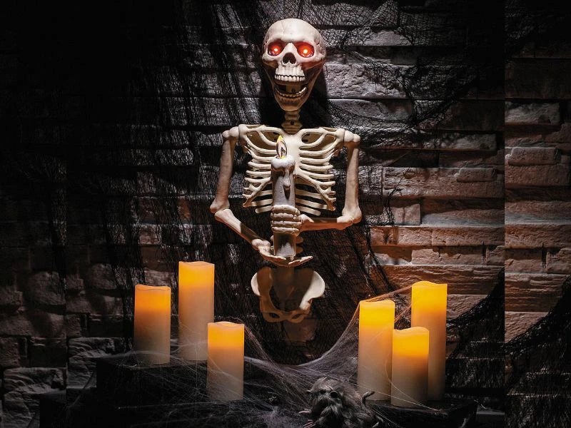 18 1/4" Skeleton Holding a Candle Wall Sconce Halloween Decoration