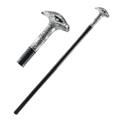 A black walking cane with ornate silver metal bird-shaped handle.