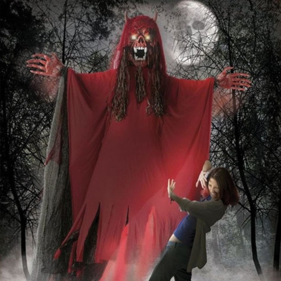 A scary and menacing 10' hanging red fanged demon Halloween decoration