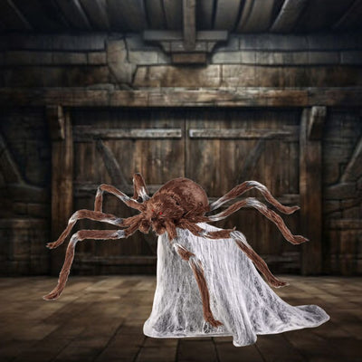 A realistic brown jumping spider toy with lifelike details and texture