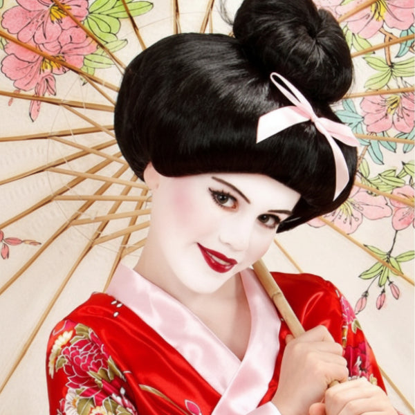 Woman in traditional Japanese kimono with black hair and a pink ribbon, holding a floral umbrella.