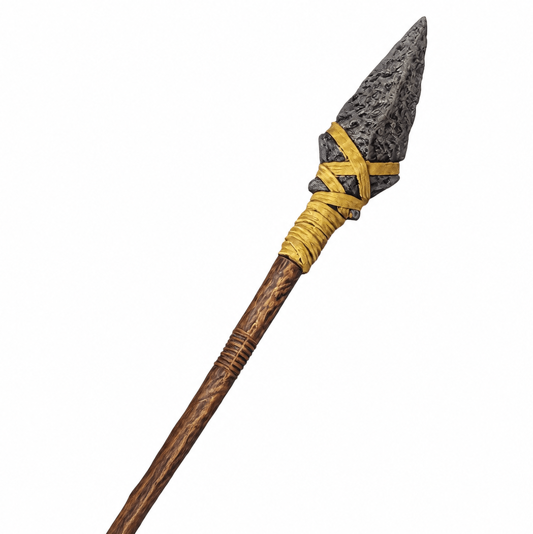 A replica of a Viking-style spearhead with a dark gray textured stone blade, wrapped in yellow cord, and a long brown wooden shaft, shown on a plain white background.