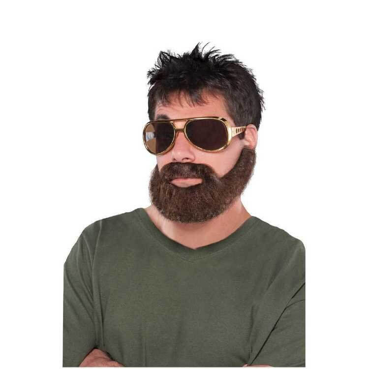 A man with a hangover holding a bottle of Beard and Moustache oil