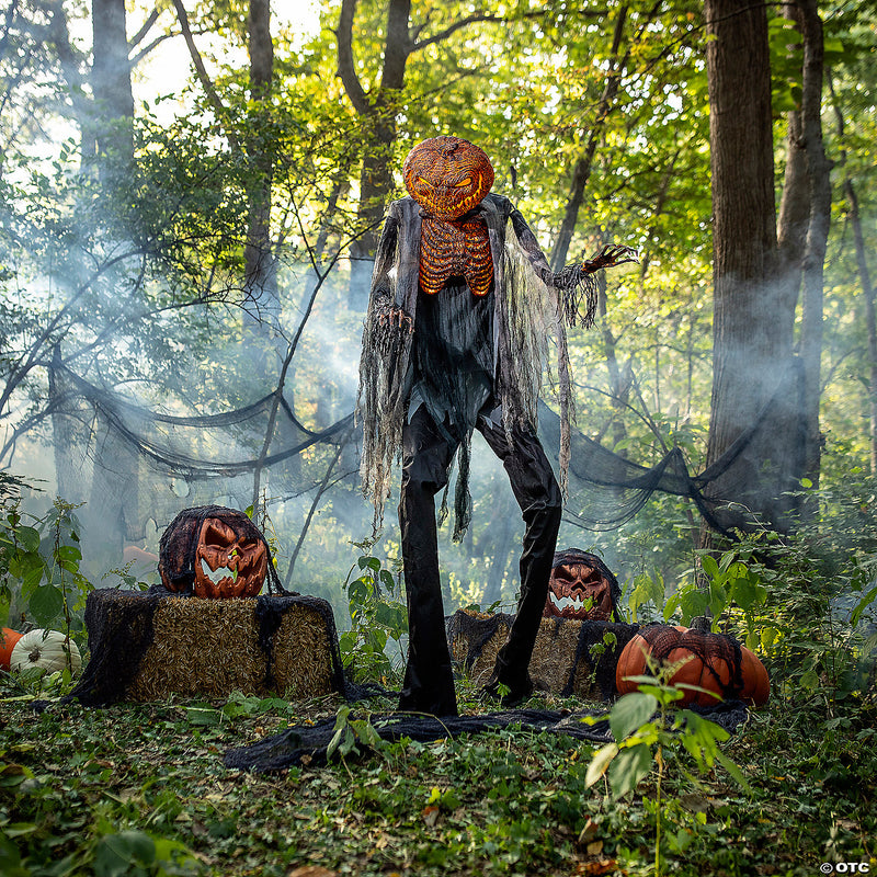 Realistic animated scorched scarecrow prop with fog machine for Halloween decor