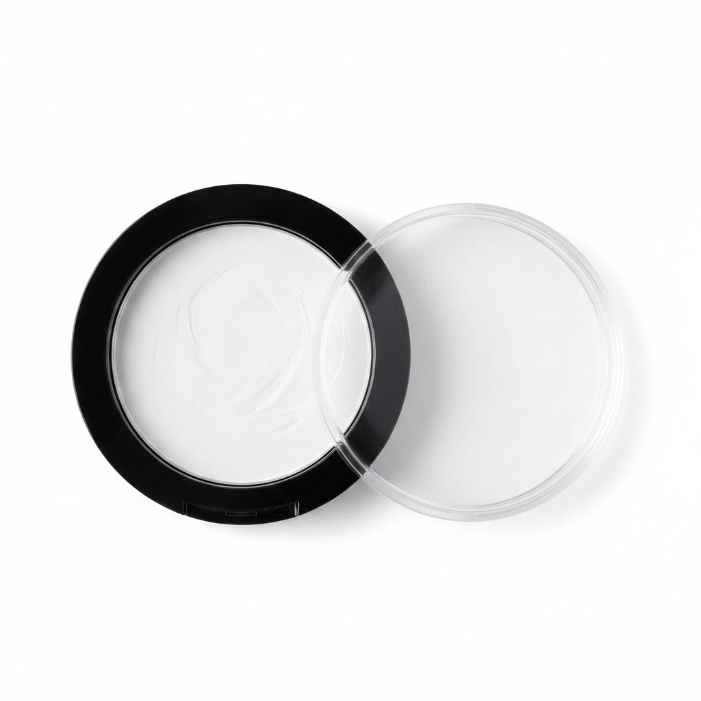 A round black cosmetic compact with a clear transparent lid, shown open on a plain white background.