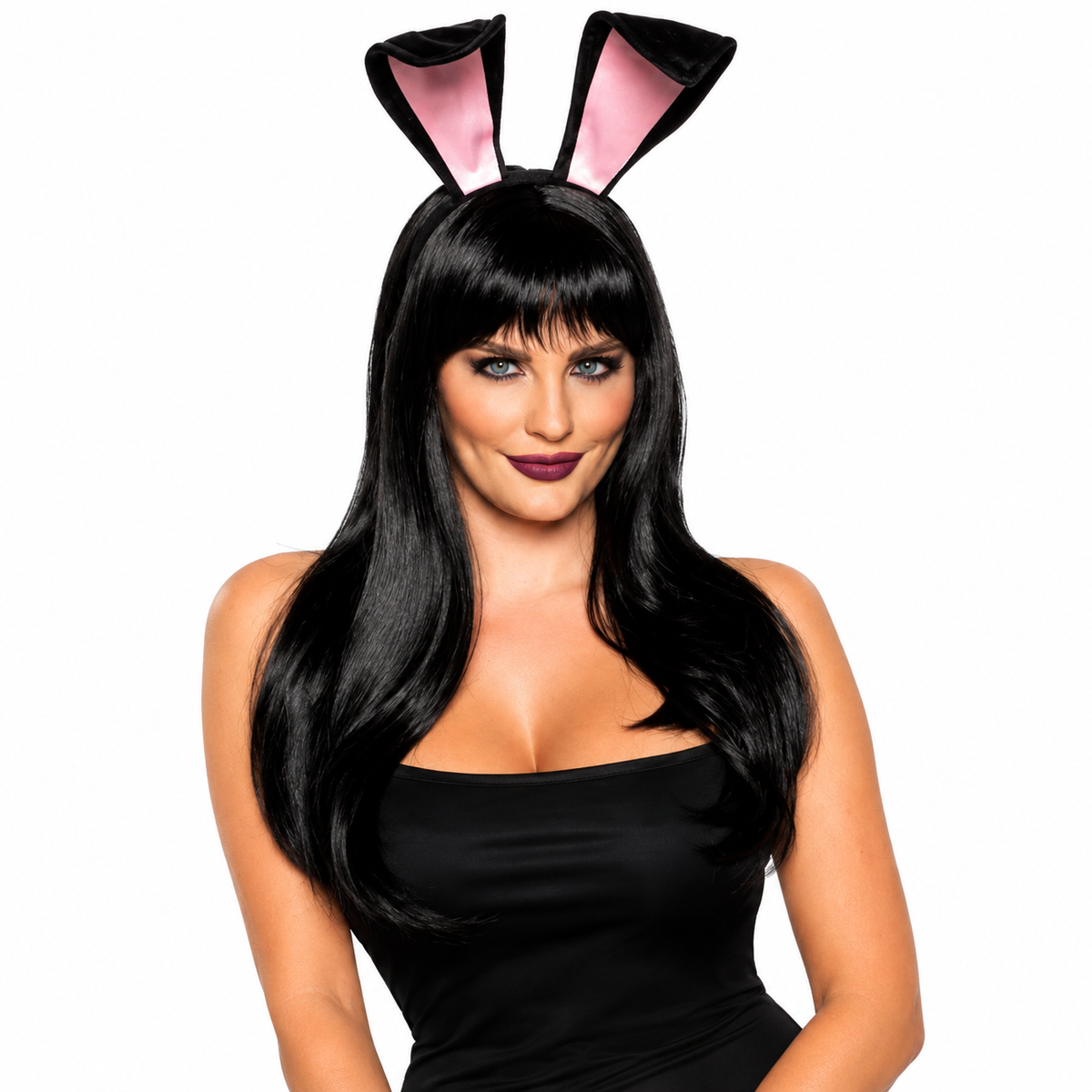 A woman wearing a black bunny costume wig with long, straight black hair and black bunny ears with pink inner linings, against a plain white background.
