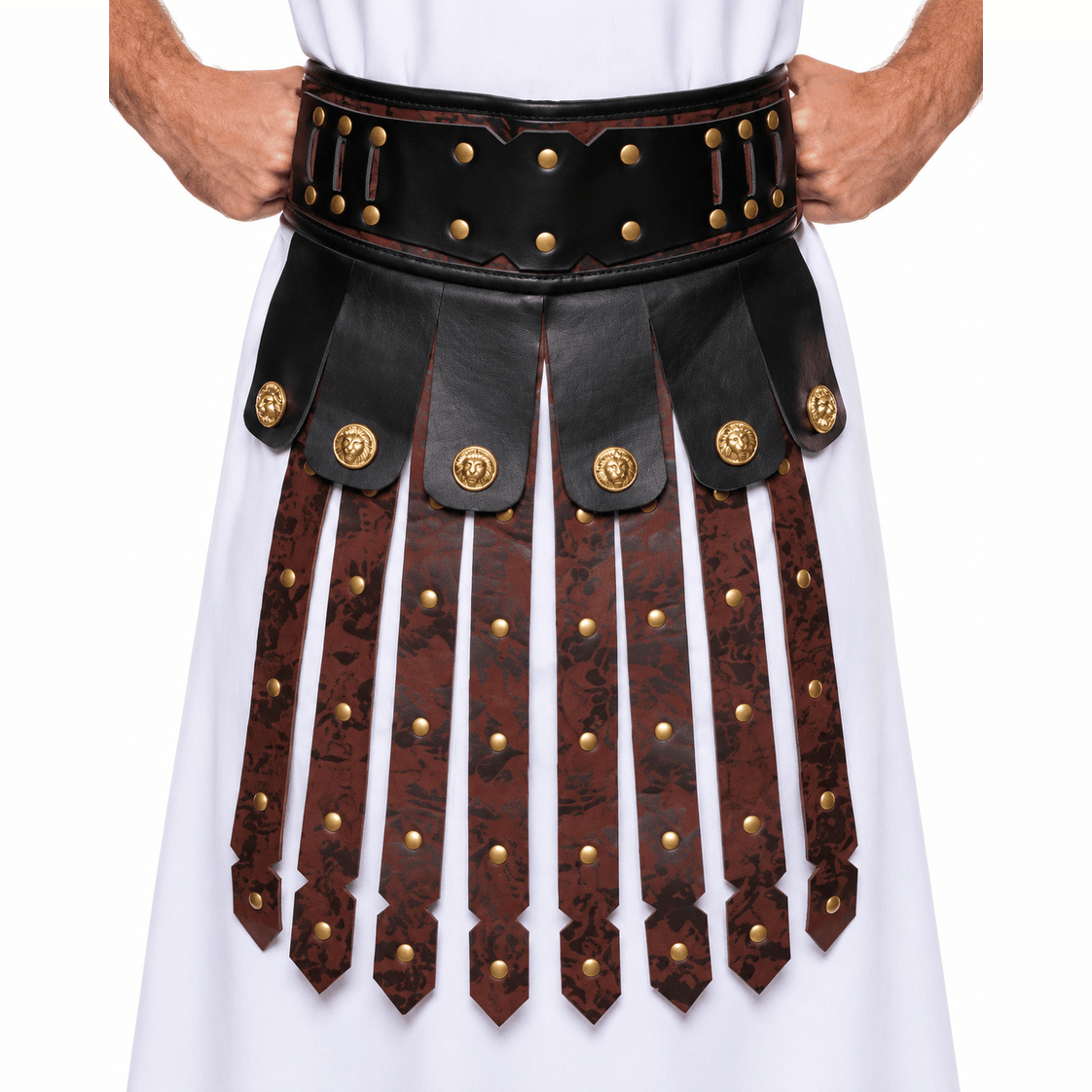A close-up of a person wearing a black and dark brown faux-leather gladiator-style waist belt with gold-tone studs and medallion hardware, paired with a white tunic.