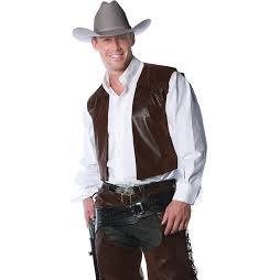 Man wearing the Cowboy Chaps Men's Costume showing a dark brown faux suede fringed vest over a white long-sleeve shirt with a grey cowboy hat on a white background