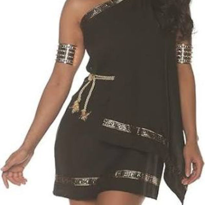 A woman modeling a black one-shoulder ancient-style costume dress with metallic gold trim, matching arm cuffs, a headband, and gold lace-up leg straps against a plain white background.