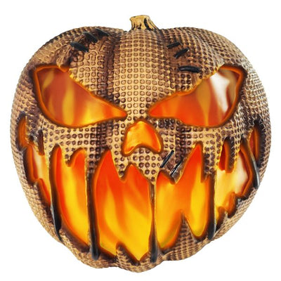  Rustic and charming autumn decor featuring a flaming burlap pumpkin