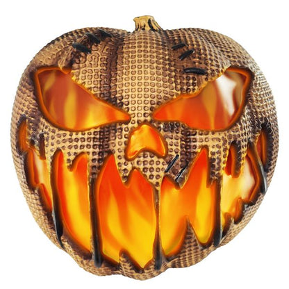  Rustic and charming autumn decor featuring a flaming burlap pumpkin