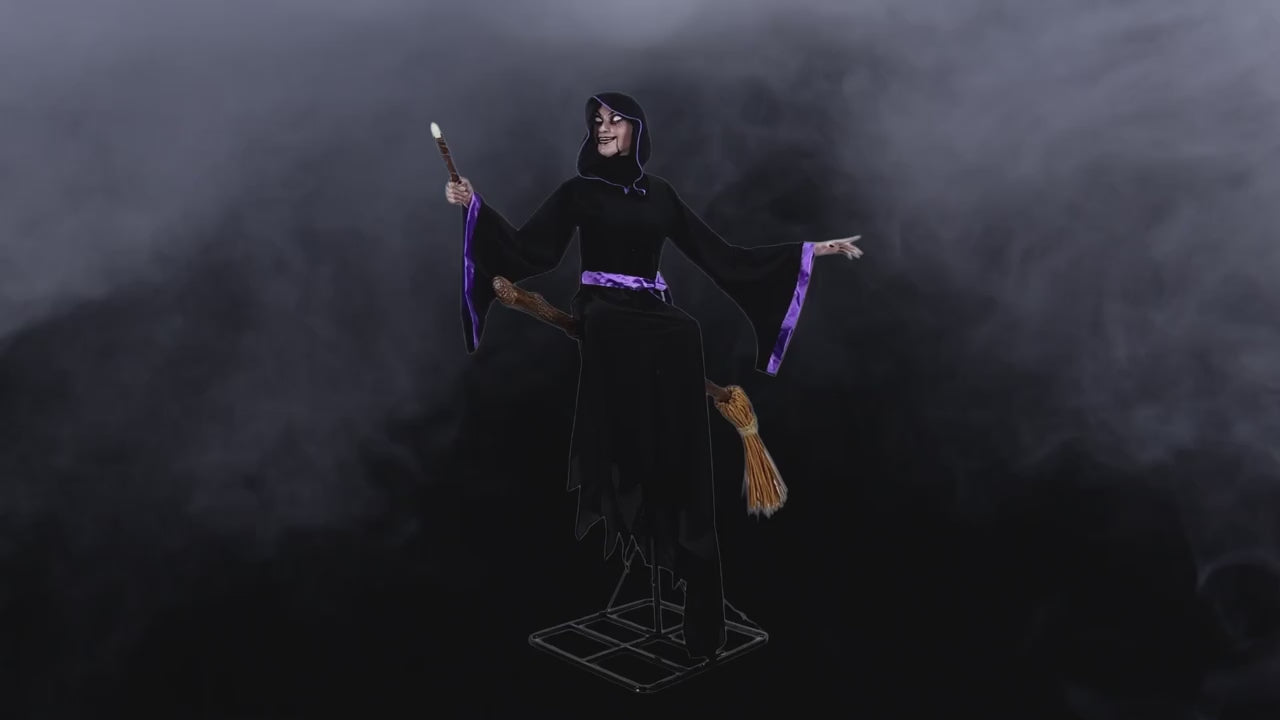 Load video: 8 Ft. Animated Light-Up Hovering Witch with Broom &amp; Wand