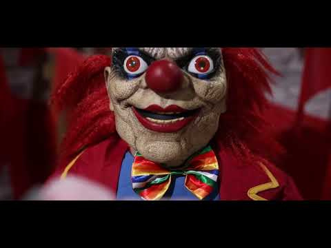 4 Ft. Animated Creepy Clown with Pink Bear Halloween Prop