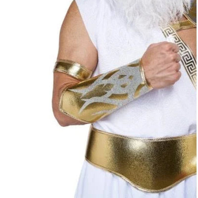 A person wearing a white costume dress with metallic gold arm bands and a wide gold belt, shown against a plain white background.