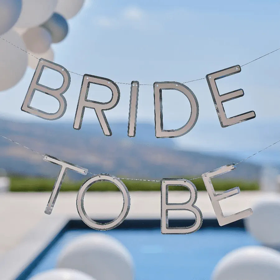 Alt text: Beautiful white and gold Bride To Be Garland by Ginger Ray, perfect for bridal showers and bachelorette parties