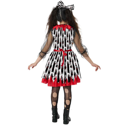 A child model shown from the back wearing a black and white striped dress costume with red trim, sheer black tulle sleeves, a red waist tie, black polka-dot tights, and black boots. She also wears a black-and-white striped bow in her hair against a plain white background.
