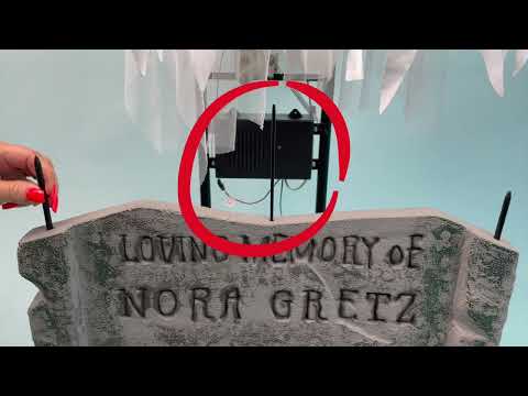 Ghost Woman Over Tombstone Animated Prop